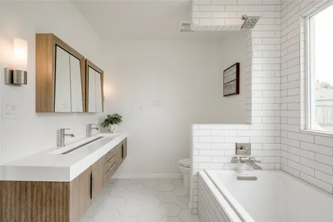 a bathroom with a sink and a bathtub