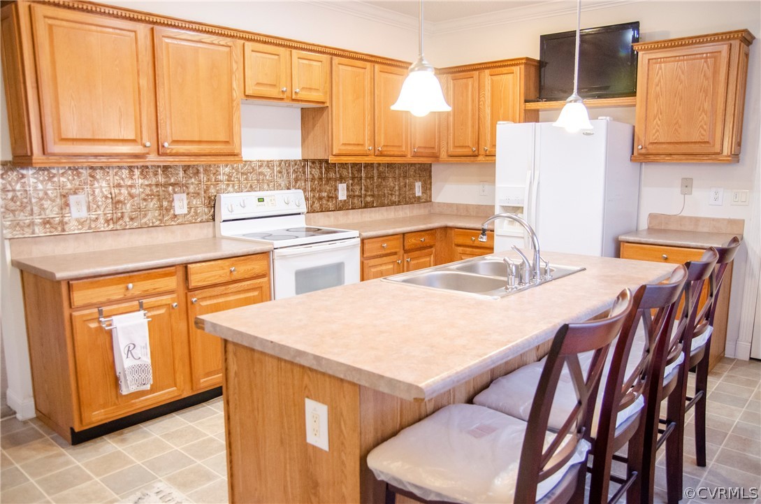 2861 Gold Mine Road Palmyra, VA 22963 - Photo 13 of 32 a kitchen with a sink a stove and a refrigerator