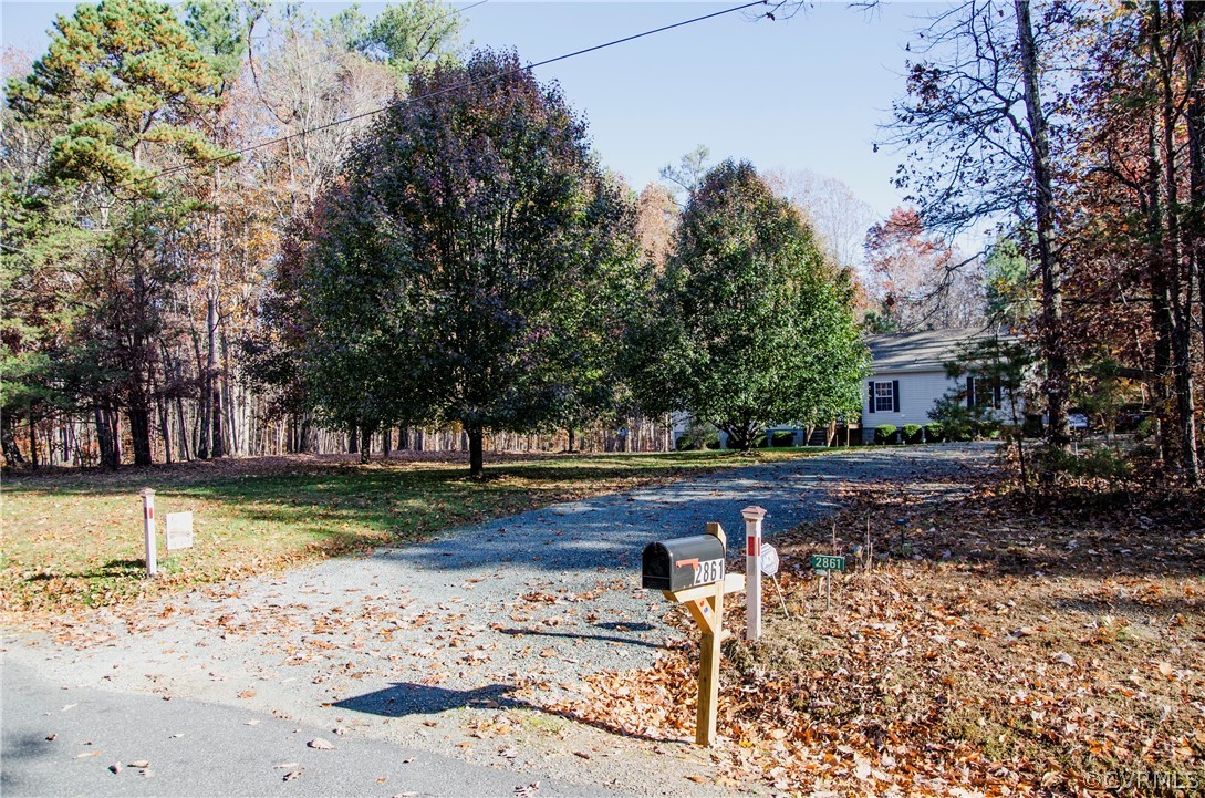 2861 Gold Mine Road Palmyra, VA 22963 - Photo 2 of 32 a view of a yard with large trees