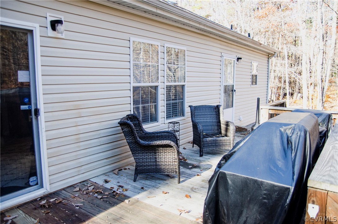 2861 Gold Mine Road Palmyra, VA 22963 - Photo 27 of 32 a view of a patio with chairs and a table and chair