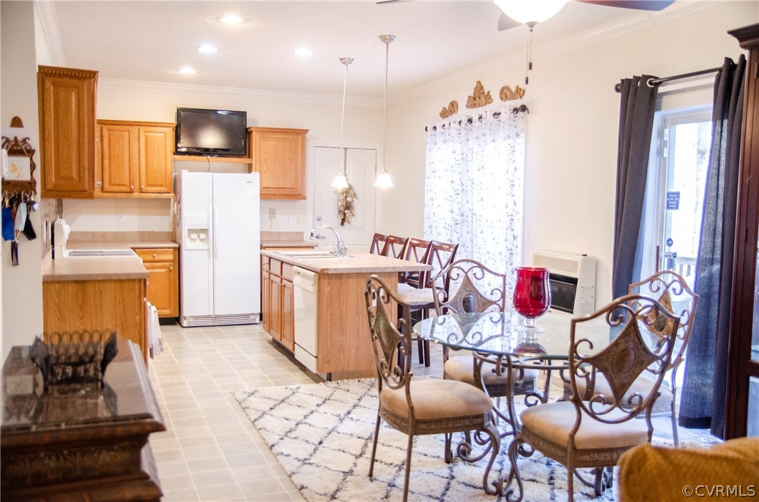 2861 Gold Mine Road Palmyra, VA 22963 - Photo 10 of 32 a kitchen with stainless steel appliances kitchen island granite countertop a sink and a refrigerator