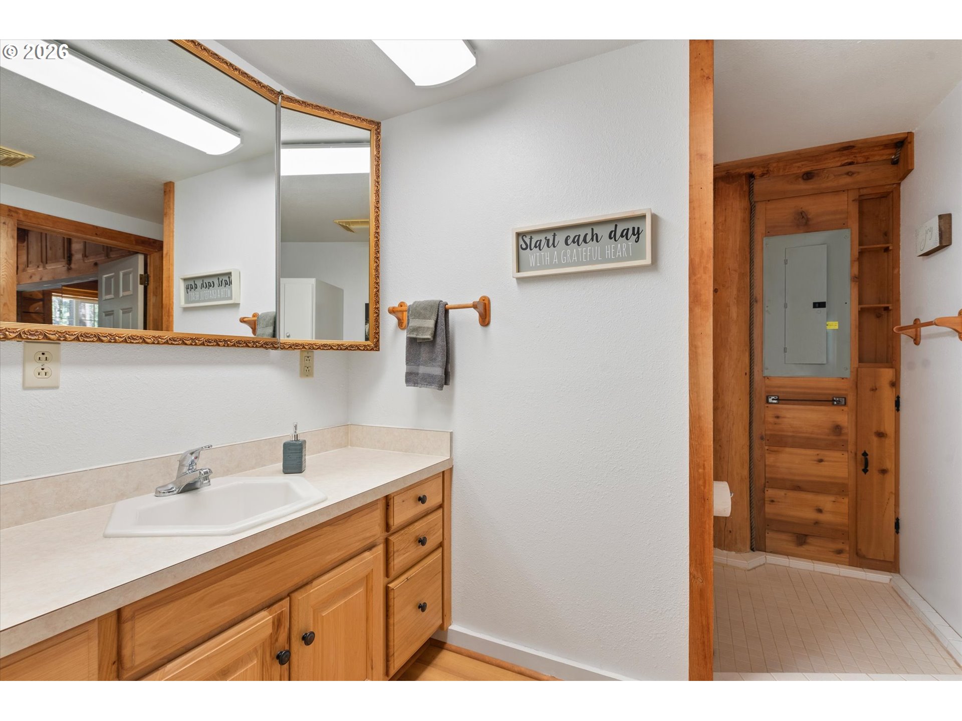 39151 Last Chance Lane Baker City, OR 97814 - Photo 19 of 48 a bathroom with a sink double vanity and a mirror