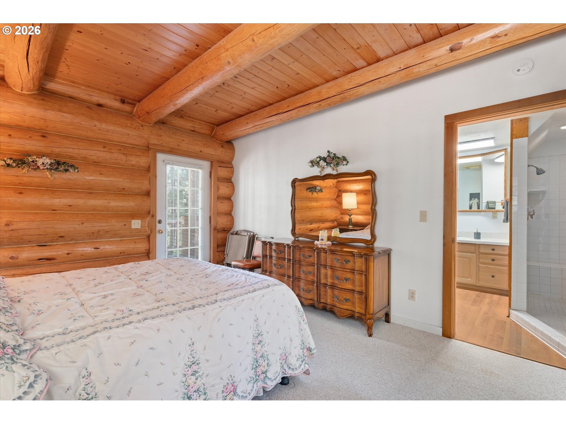 39151 Last Chance Lane Baker City, OR 97814 - Photo 21 of 48 a bedroom with a bed and wooden floor
