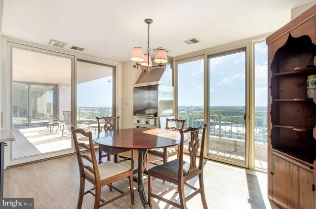 a living room with furniture and a gate