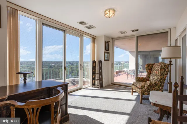 a bedroom with a bed and a lamp