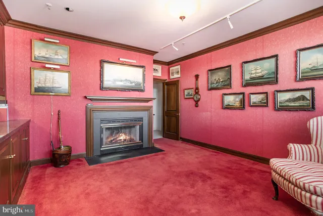 a view of a livingroom with furniture and windows