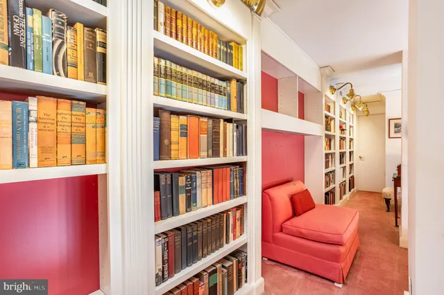 a view of a building with garden and trees