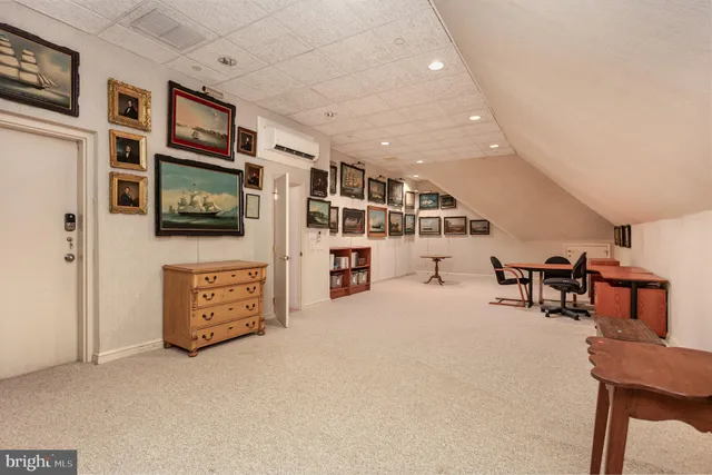 a view of a chairs and table in the backyard