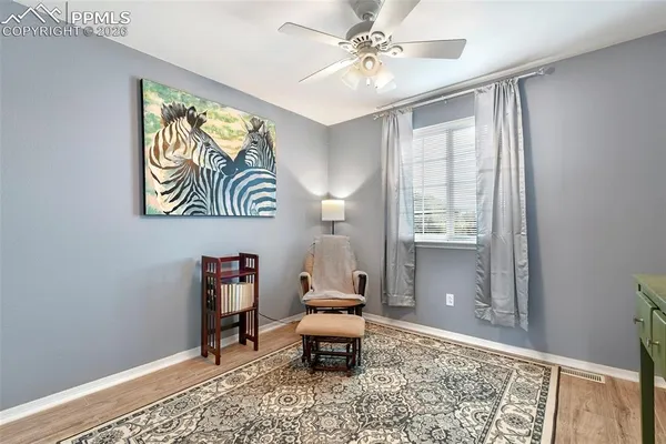 a living room with a couch and a table