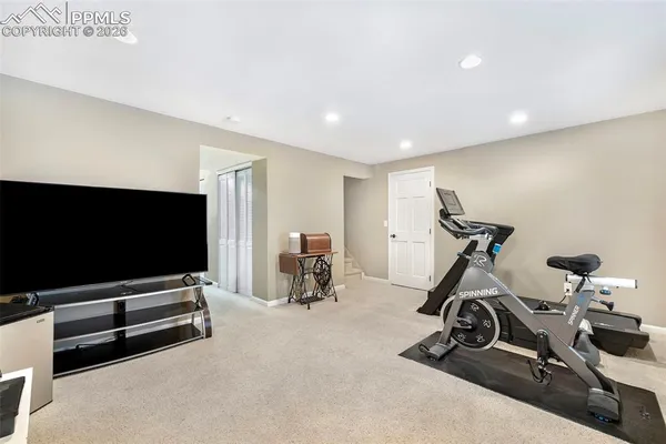a view of a room with gym equipment