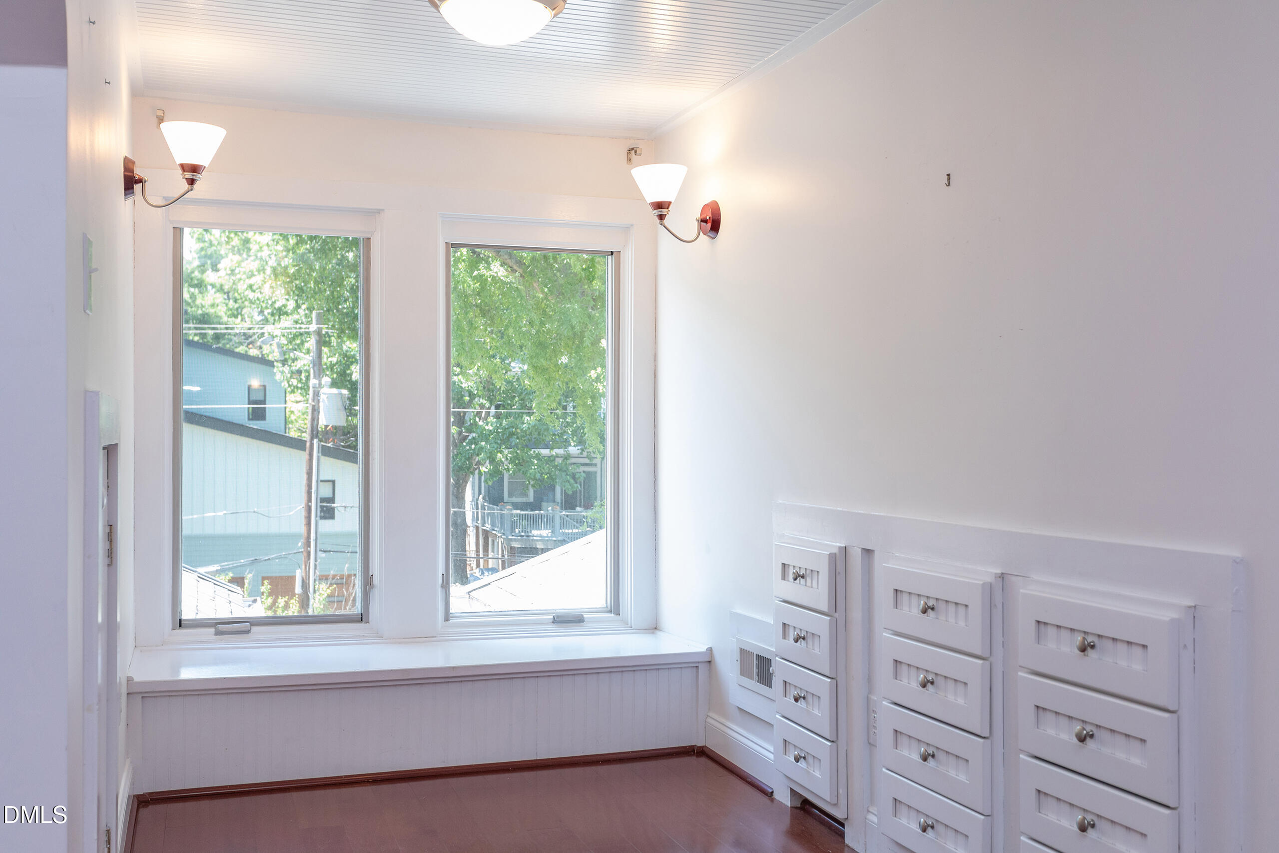 127 Forest Road Raleigh, NC 27605 - Photo 69 of 75 a view of a bedroom with a bed and a window
