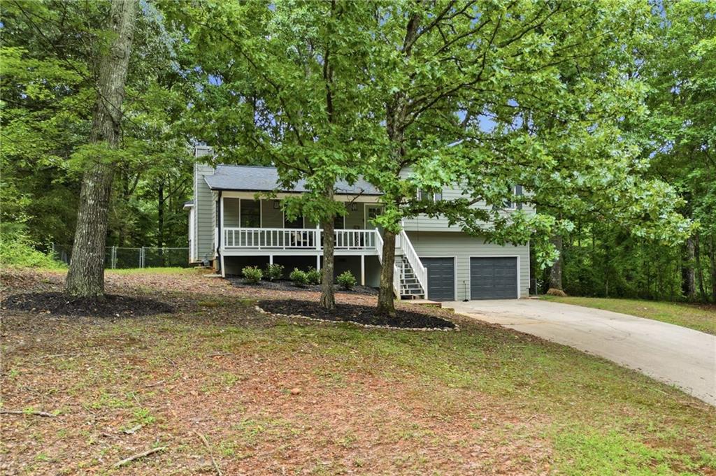 404 Brooks Street Dallas, GA 30157 - Photo 33 of 38 a front view of a house with garden