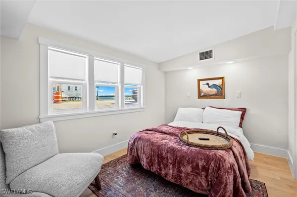 a bedroom with a bed and a closet