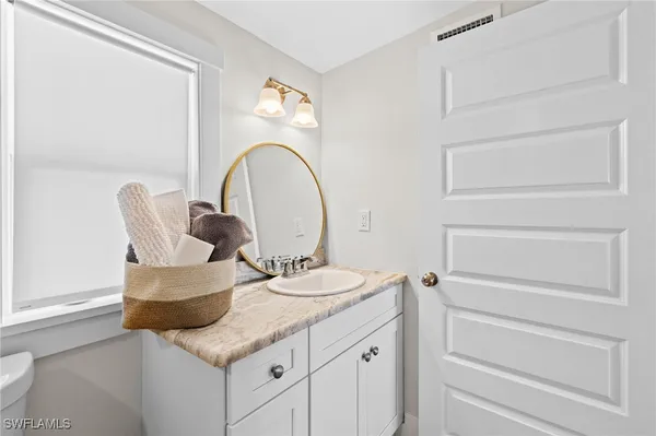 a bathroom with a shower and a toilet