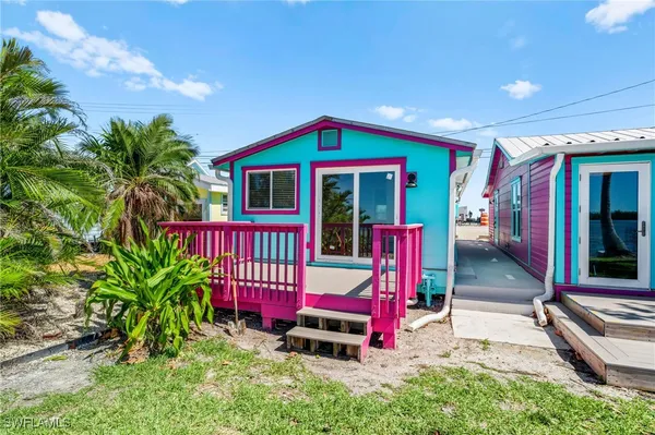 a view of swimming pool with red door