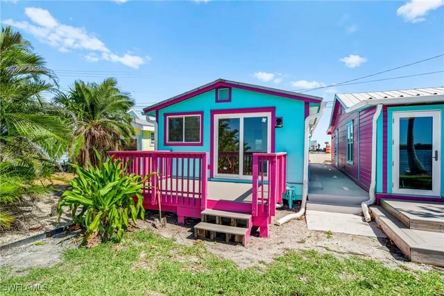 a view of swimming pool with red door