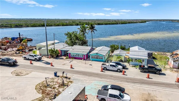 a group of cars parked in front of building