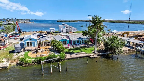 aerial view of a house with a tree