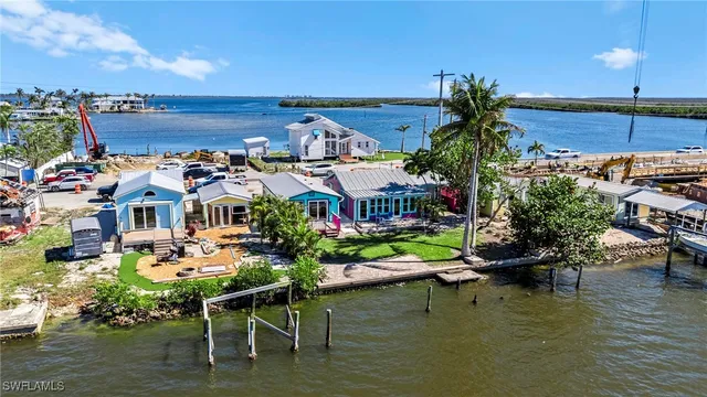 aerial view of a house with a tree