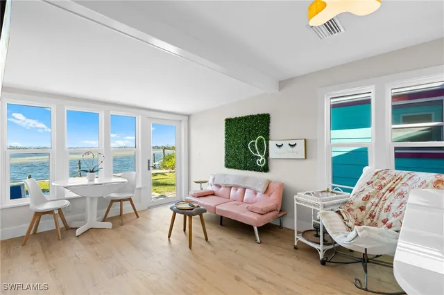 a kitchen with stainless steel appliances a refrigerator sink and stove