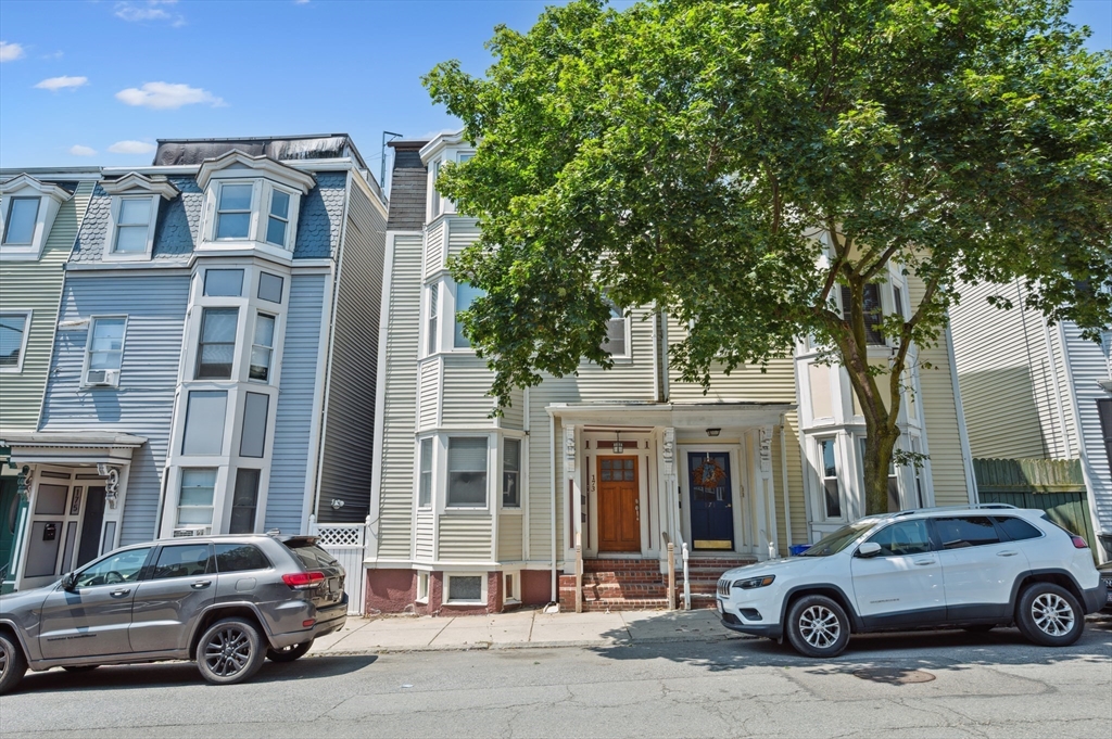 173 H Street, Unit 2 Boston, MA 02127 - Photo 22 of 26 a car parked in front of a building