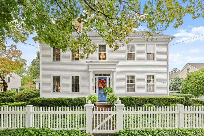 33 Old Boston Post Road Old Saybrook, CT 06475 - Photo 1 of 1 a front view of a house with a garden