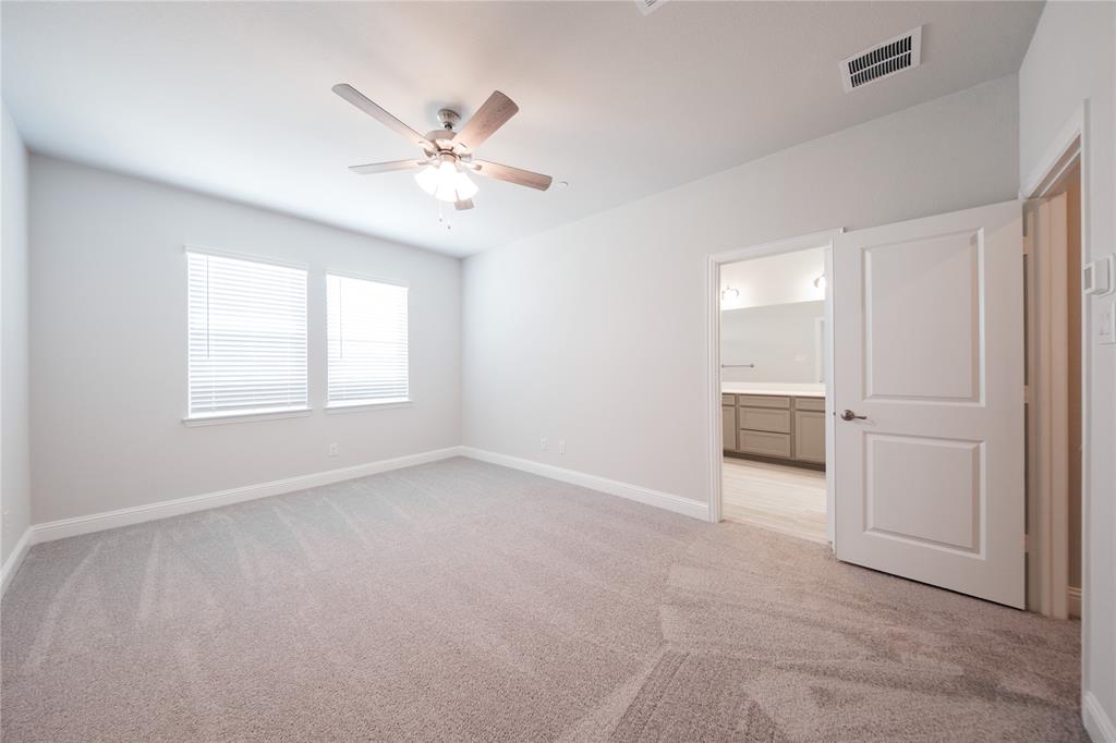 2116 Naples Drive Rowlett, TX 75088 - Photo 10 of 30 Primary Bedroom