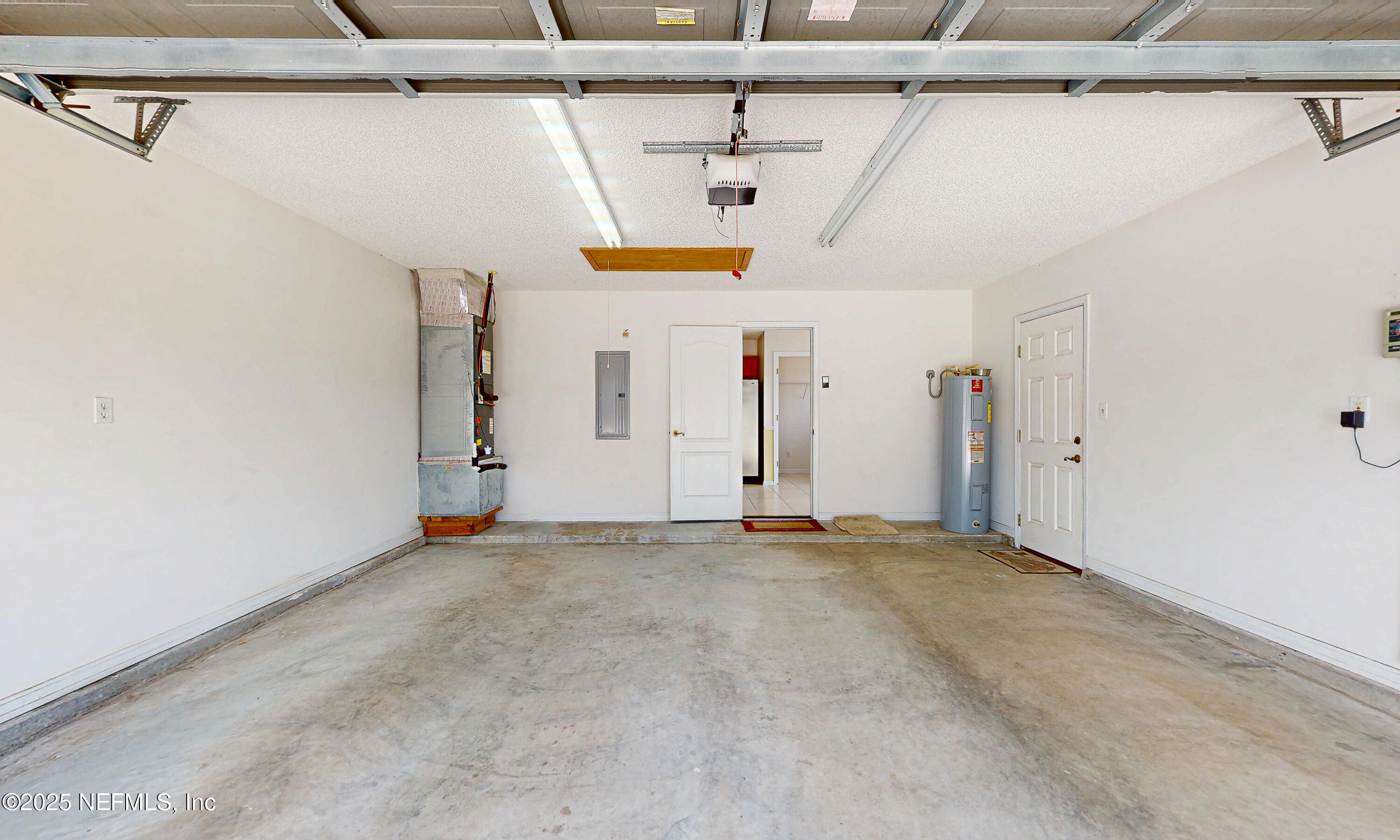 2031 Canyon Rim Place Middleburg, FL 32068 - Photo 19 of 38 a view of a garage