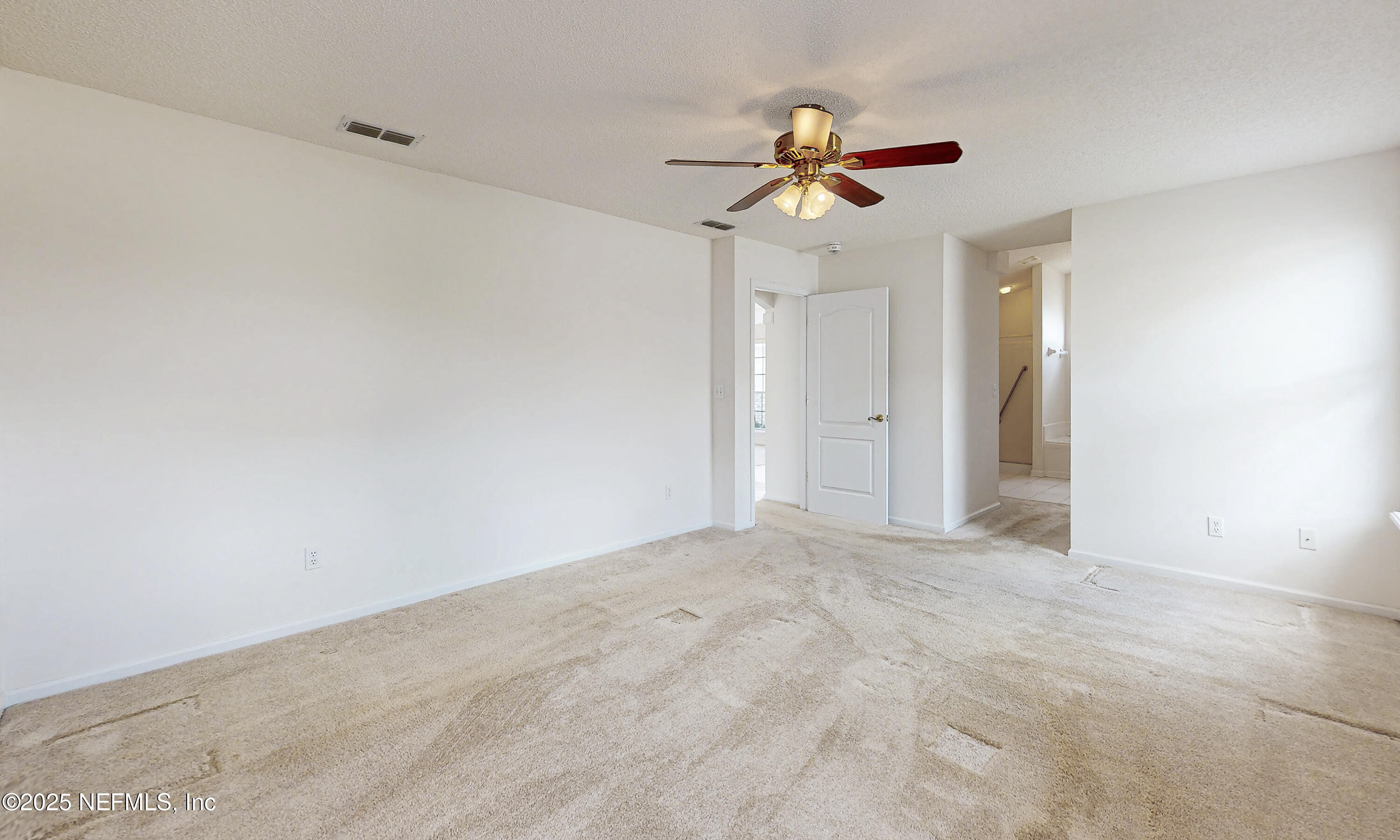 2031 Canyon Rim Place Middleburg, FL 32068 - Photo 25 of 38 a view of empty room with ceiling fan