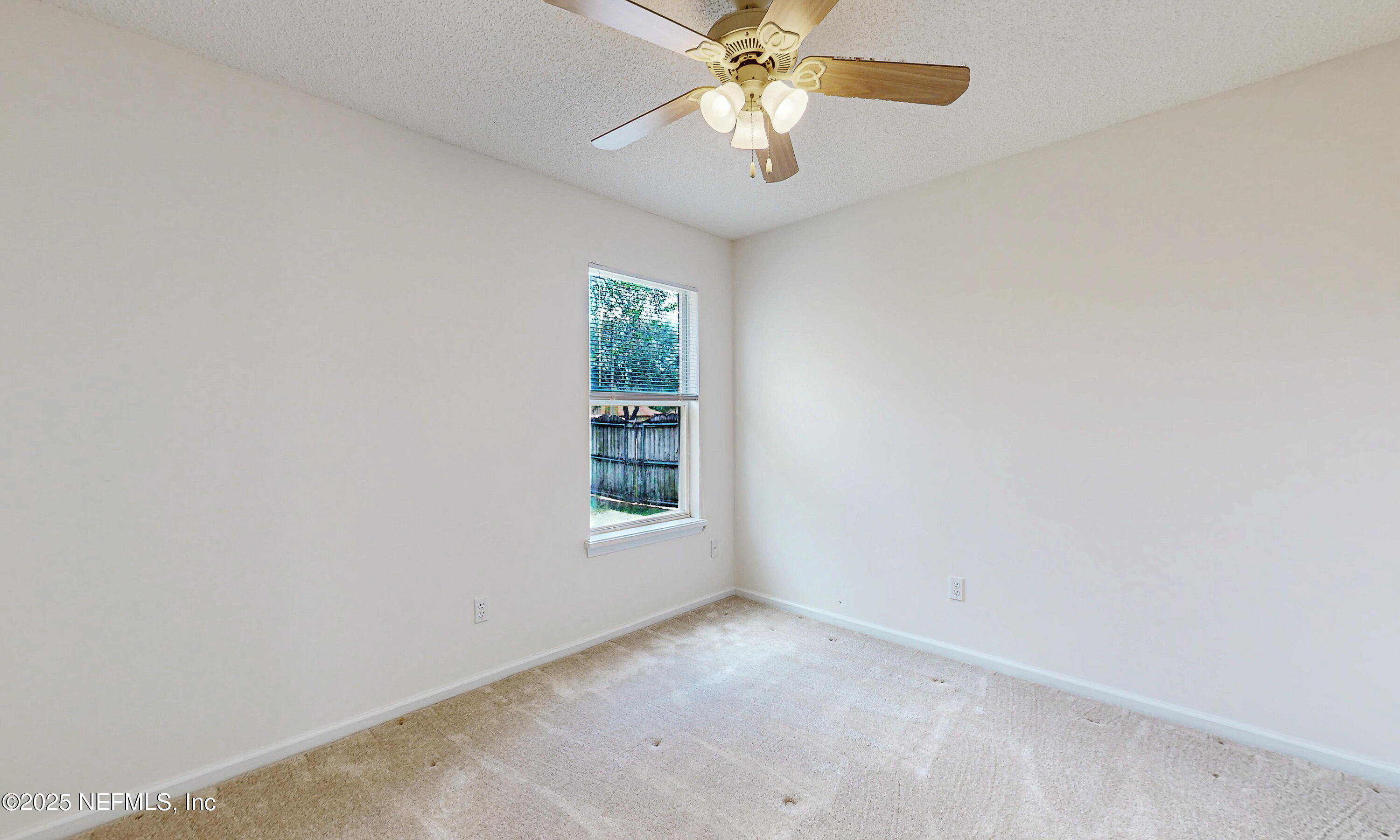 2031 Canyon Rim Place Middleburg, FL 32068 - Photo 35 of 38 an empty room with a window