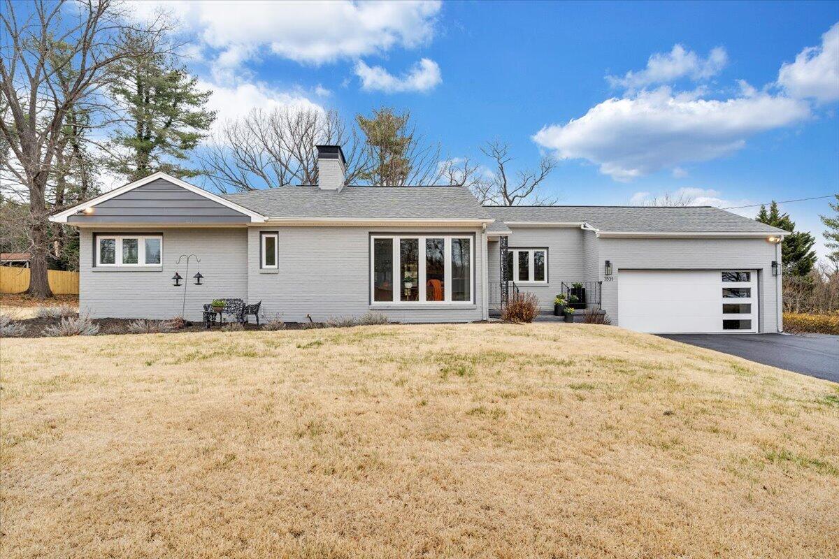 3531 Winding Way Road Southwest Roanoke, VA 24015 - Photo 2 of 70 a front view of a house with a yard