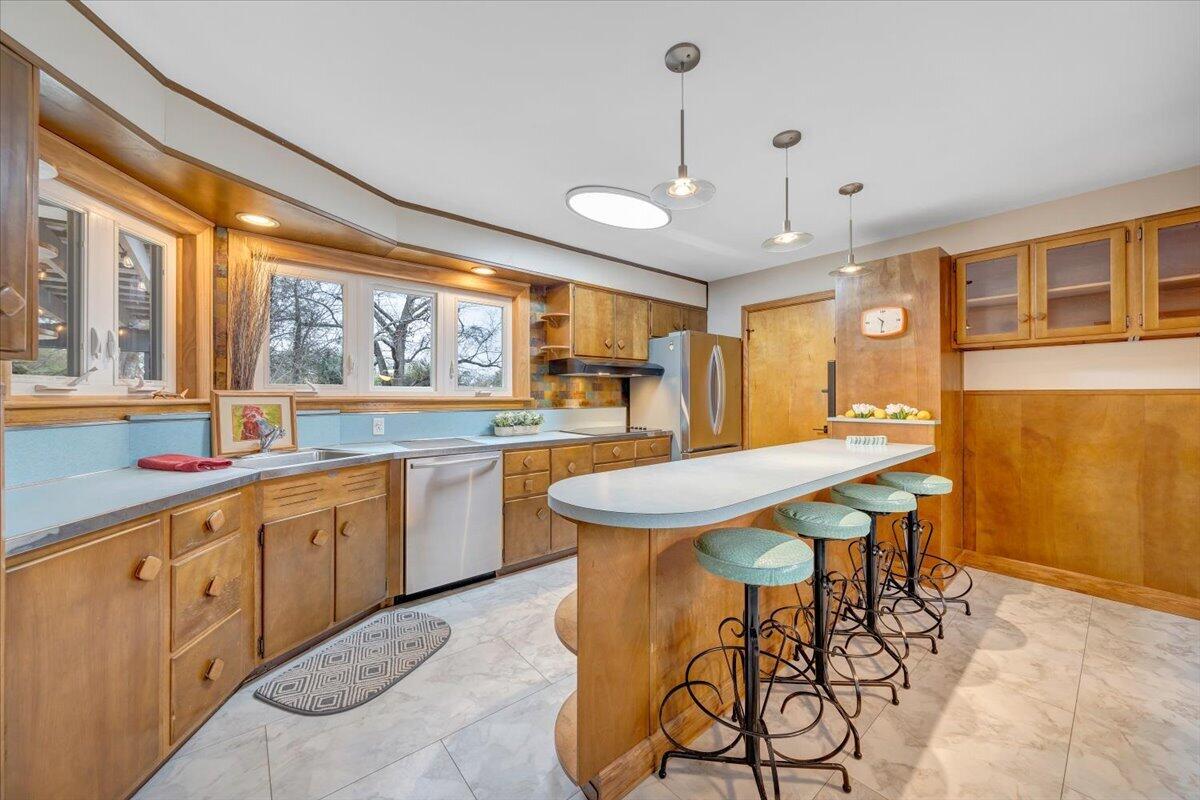 3531 Winding Way Road Southwest Roanoke, VA 24015 - Photo 37 of 70 a large kitchen with a table and chairs