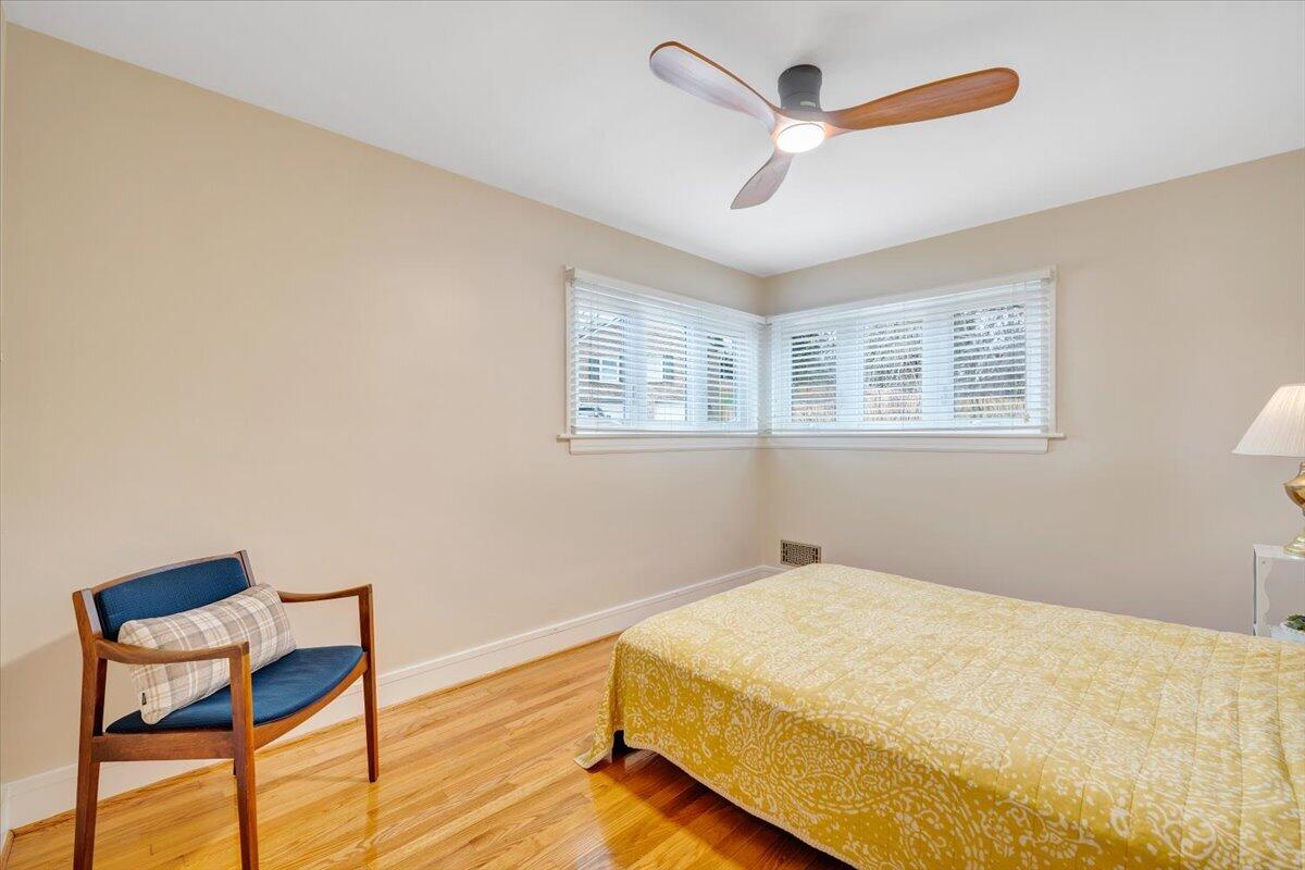 3531 Winding Way Road Southwest Roanoke, VA 24015 - Photo 48 of 70 a bedroom with a bed and a chair