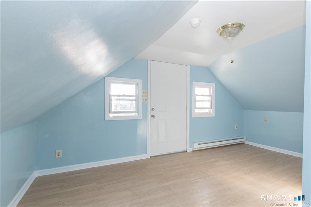 18 Lawrence Street Norwalk, CT 06854 - Photo 26 of 31 an empty room with windows
