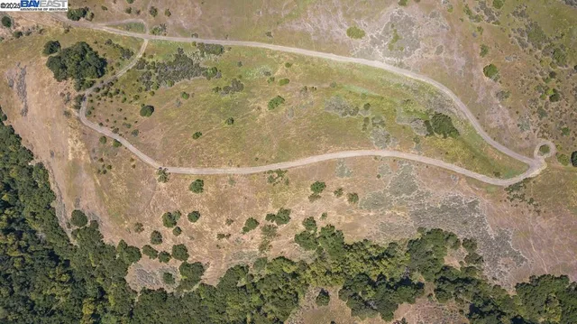 an aerial view of mountain with beach