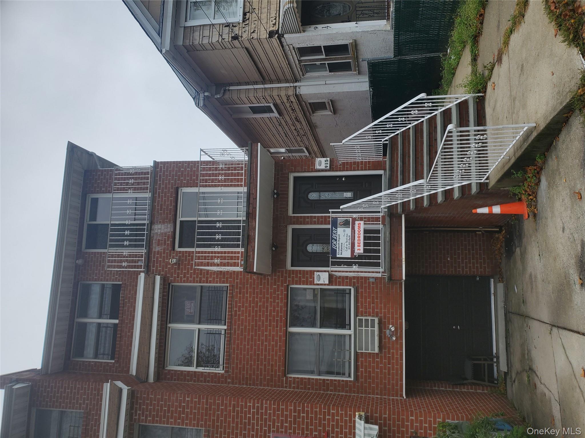 a front view of a house with a garage