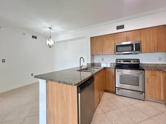 $320,000 | 6450 Emerald Dunes Drive, Unit 301, West Palm Beach, FL 33411