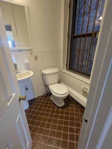 a bathroom with a sink and mirror