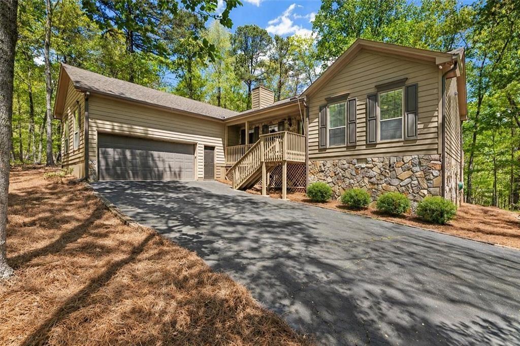 190 Red Coat Pass Jasper, GA 30143 - Photo 1 of 43 a front view of a house with a yard