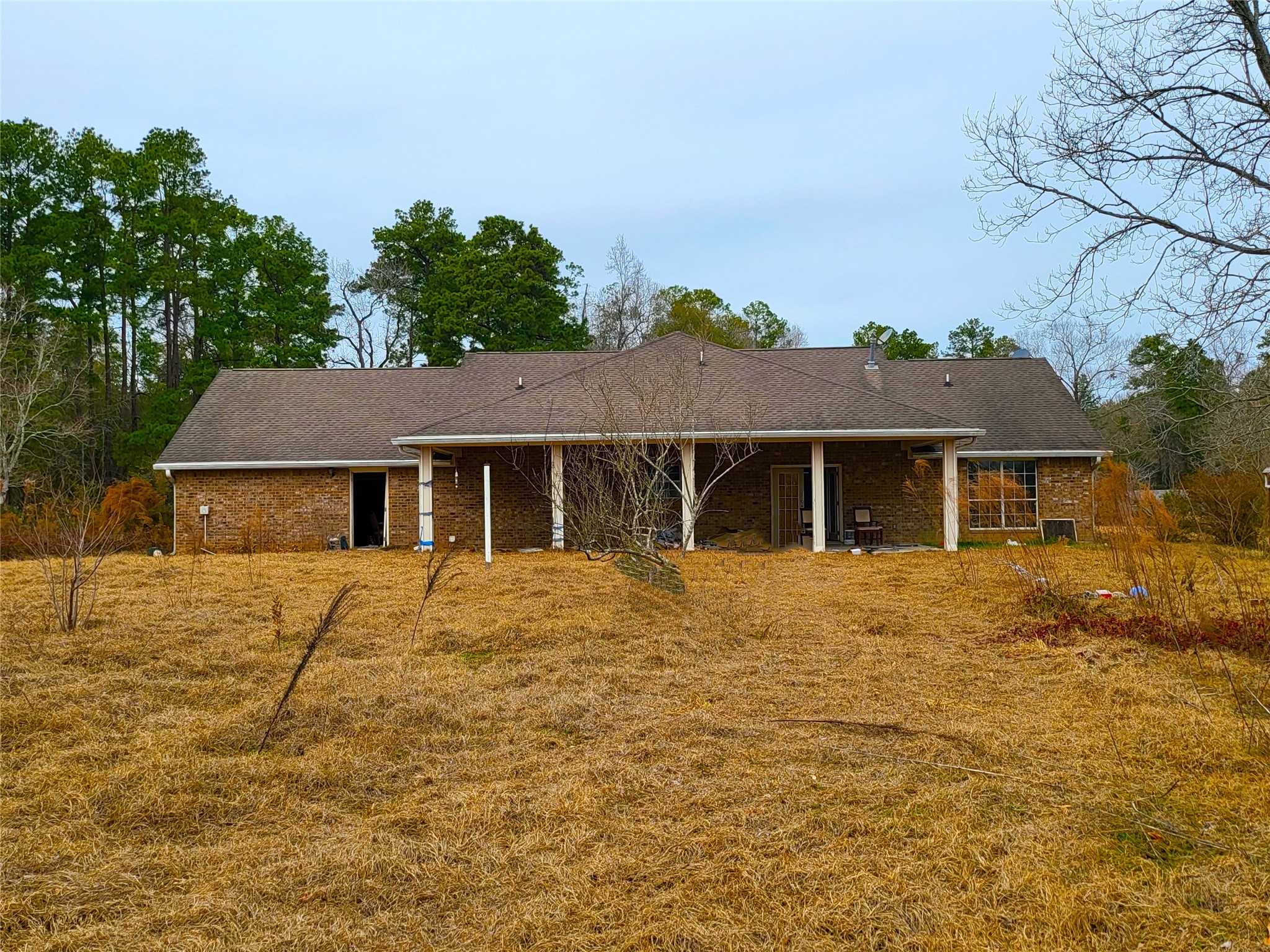 19320 Willaby Road New Caney, TX 77357 - Photo 10 of 14 a front view of a house with a garden