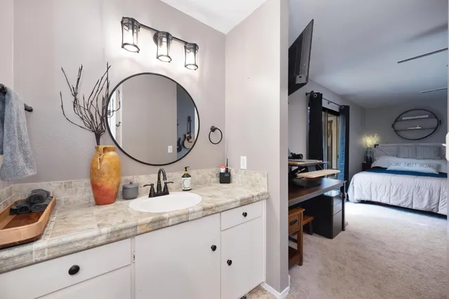 a view of a house with backyard and porch