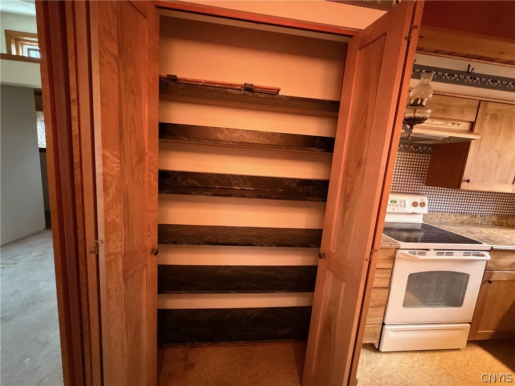 5018 Erron Hill Road Locke, NY 13092 - Photo 17 of 42 lots of shelving in kitchen
