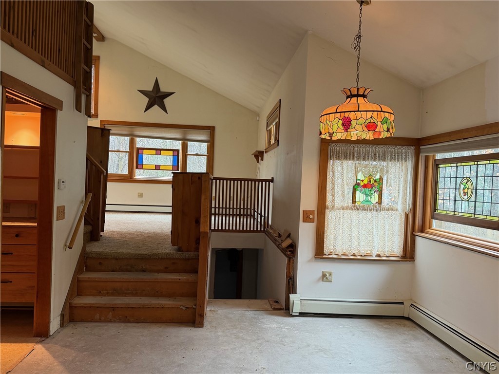 5018 Erron Hill Road Locke, NY 13092 - Photo 22 of 42 dining room with stairs to living room and loft