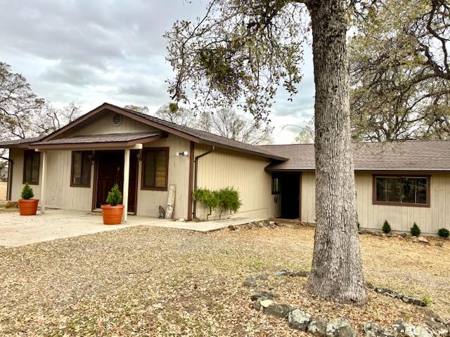 18288 Mountaintop Lane Grass Valley, CA 95949 - Photo 1 of 40 a front view of a house with a yard covered in snow
