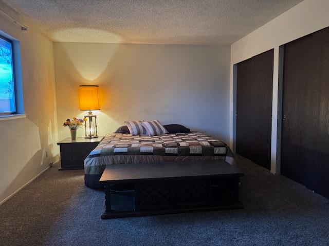 18288 Mountaintop Lane Grass Valley, CA 95949 - Photo 11 of 40 a bedroom with a bed and window