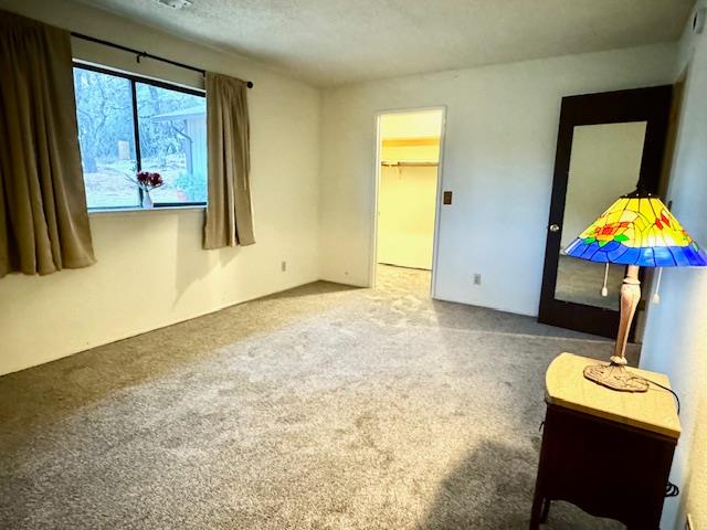 18288 Mountaintop Lane Grass Valley, CA 95949 - Photo 14 of 40 a view of a room with furniture and a flat screen tv