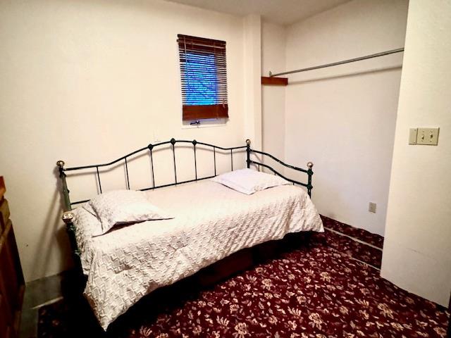 18288 Mountaintop Lane Grass Valley, CA 95949 - Photo 22 of 40 a bedroom with a bed and a window