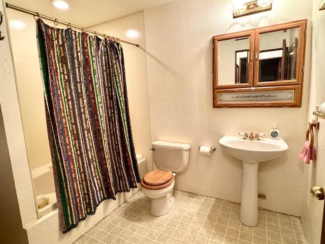 18288 Mountaintop Lane Grass Valley, CA 95949 - Photo 23 of 40 a bathroom with a sink and a toilet