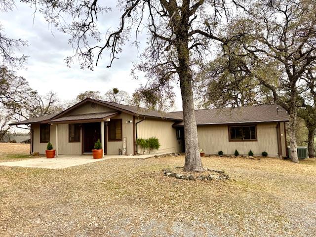 18288 Mountaintop Lane Grass Valley, CA 95949 - Photo 28 of 40 a front view of a house with a yard covered in snow