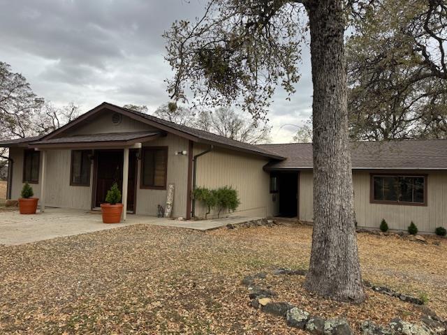 18288 Mountaintop Lane Grass Valley, CA 95949 - Photo 33 of 40 a front view of a house with a yard